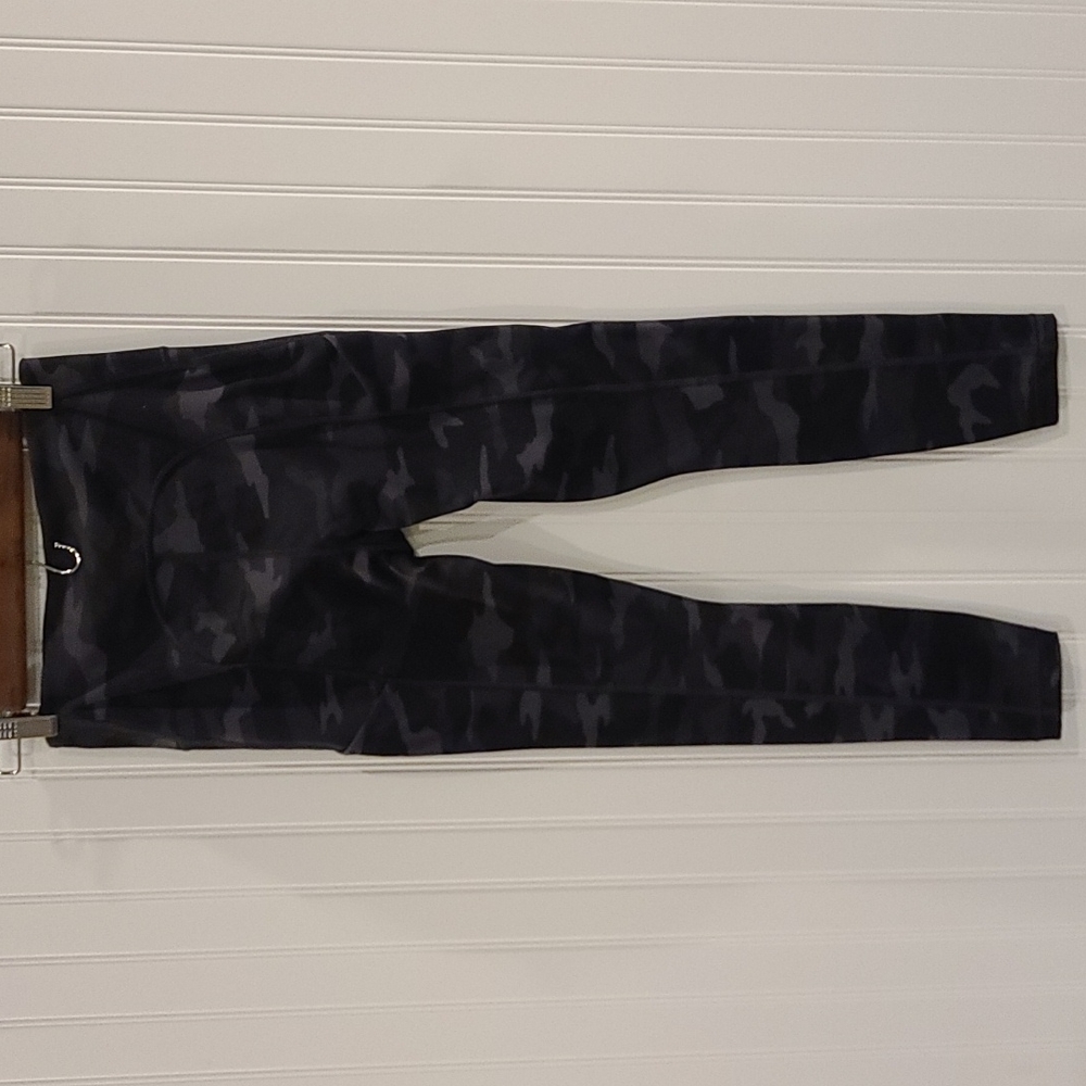 Practically brand new!  Athleta Ultimate 7/8 tights in black camo print. Size XS - Picture 9 of 9